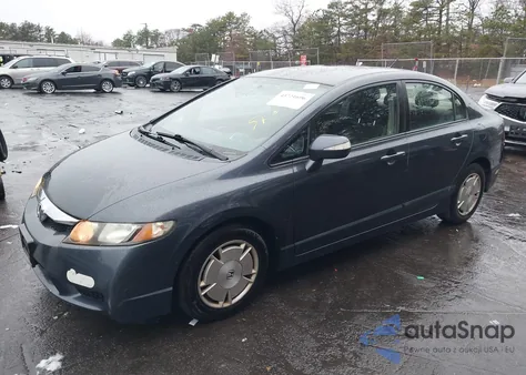 2010 Honda Civic Hybrid from USA, damaged, VIN JHMFA3F2XAS006331